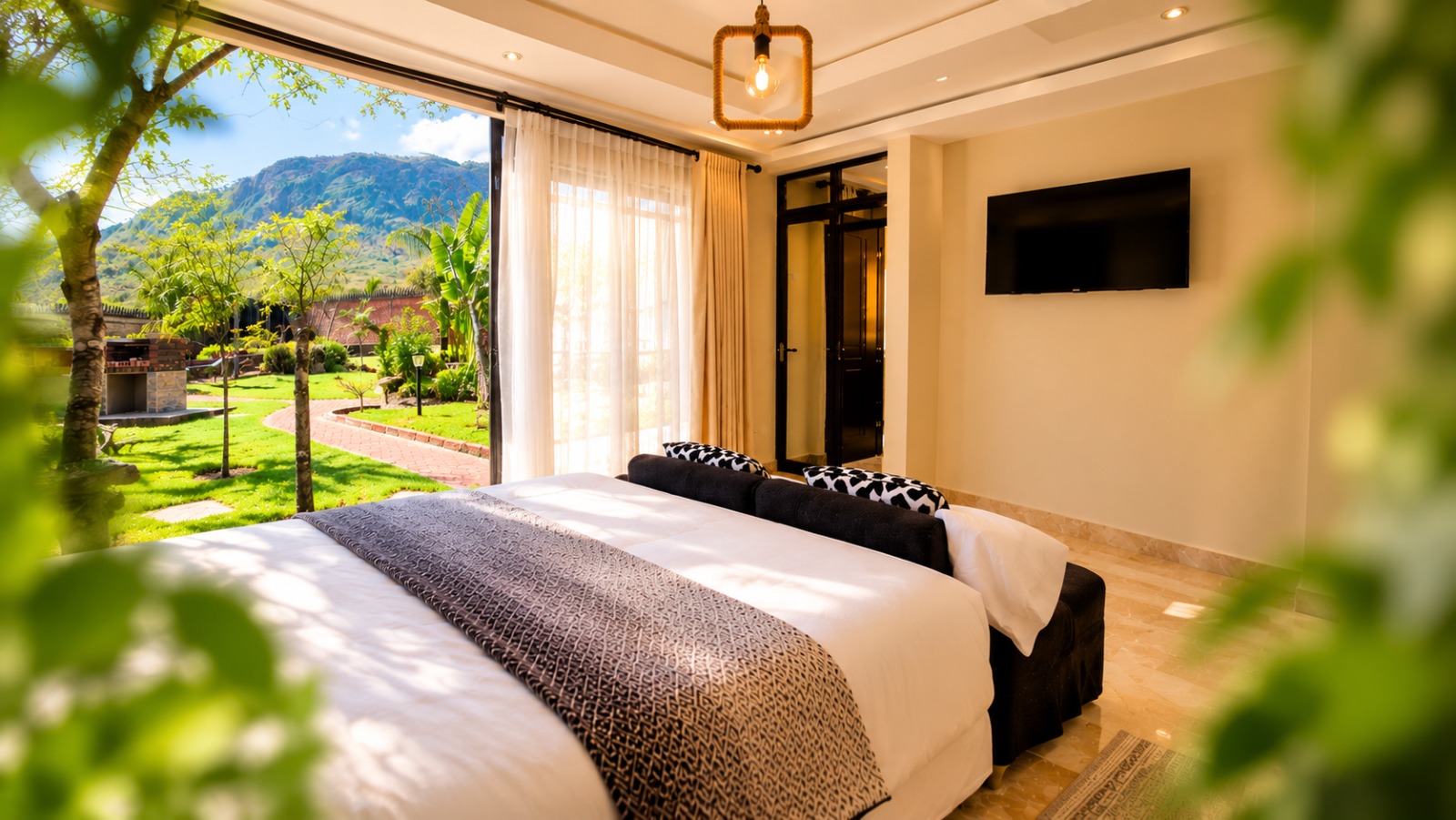 A Forest Creek suite, its doors open onto the garden and the mountain