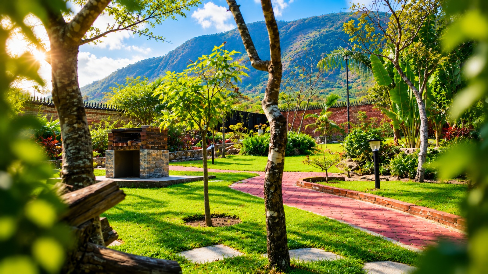 The lodge garden and braai stand beneath the Vumba mountains